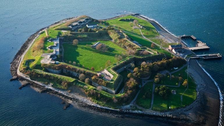 From high above, an aerial perspective reveals Georges Island, one of the Boston Harbor Islands, which houses a storied historic fort.